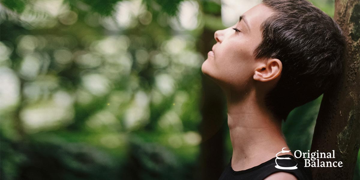 Original-Balance-Mindset-Mastery-photo-of-a-woman-in-the-forest-meditating